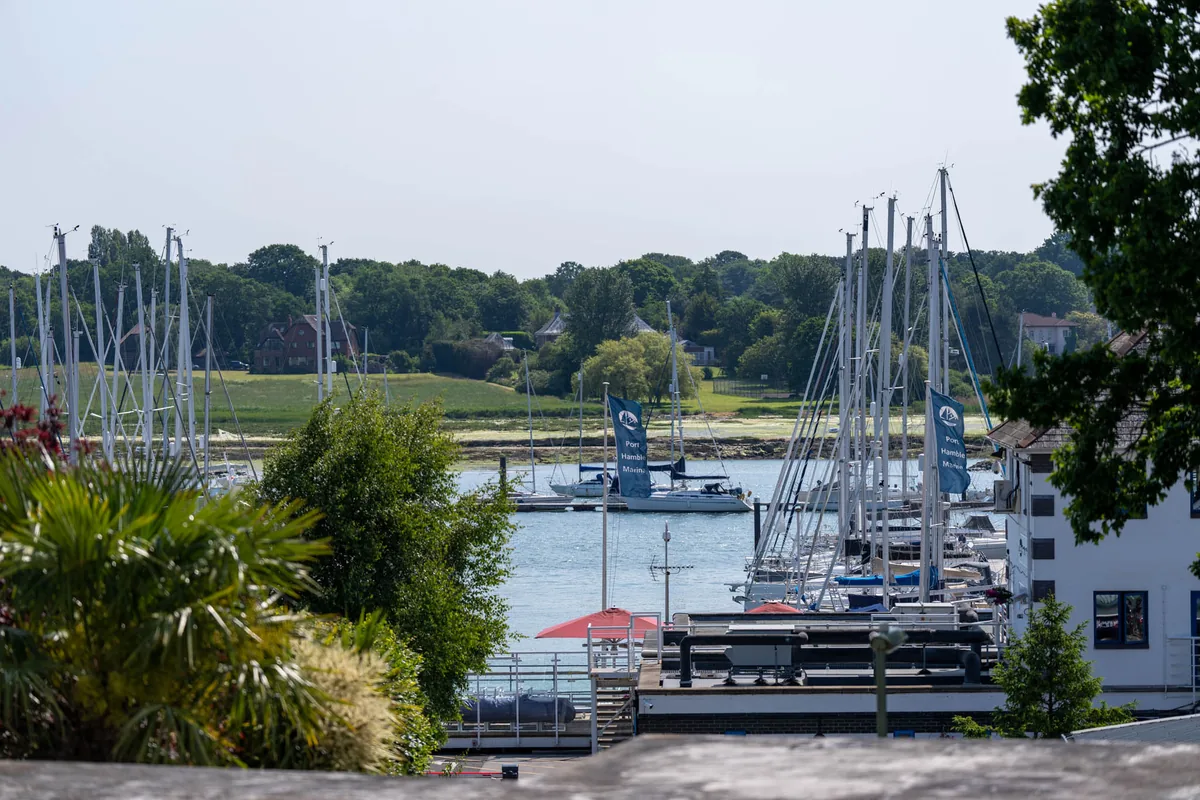 The Hamble waterfront, with boatyards and yachts along the river
