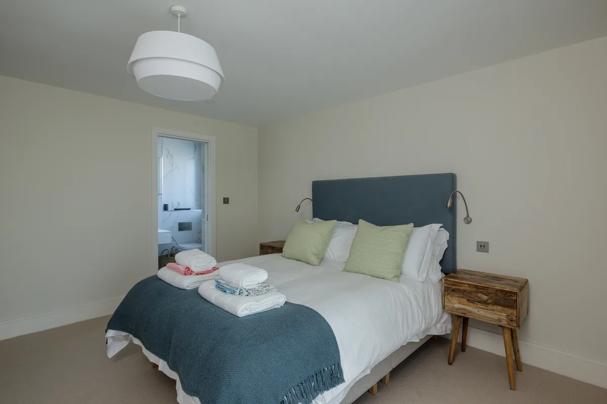 Bedroom three — king bed and en-suite, and can be made up as twins